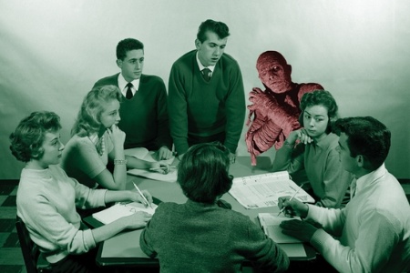 Mummy sitting with students
