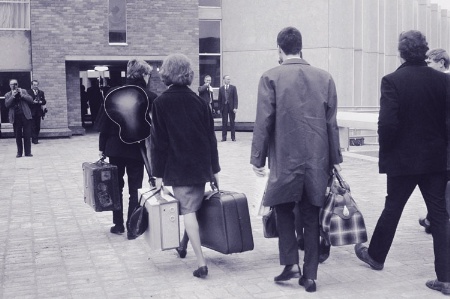 People walking into a building