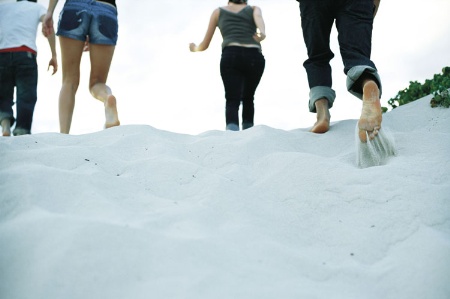 People running on a beach