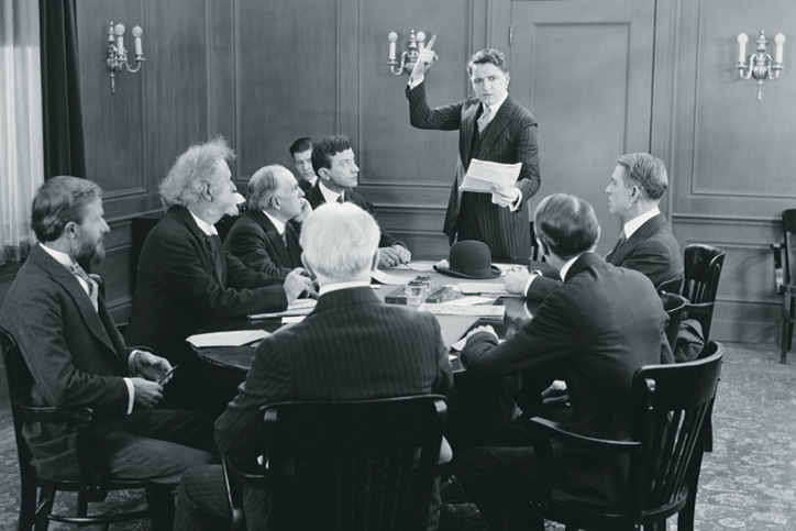 Business people in boardroom meeting (black and white) Business people in boardroom meeting (black and white)