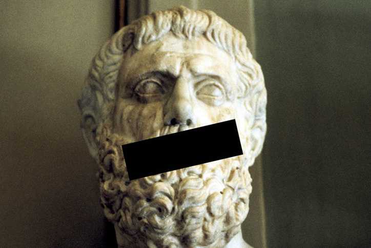 Bust sculpture with tape over mouth Bust sculpture with tape over mouth