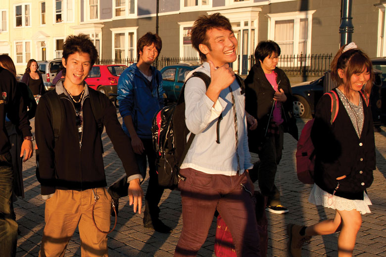 Chinese university students, Aberystwyth promenade, Wales Chinese university students, Aberystwyth promenade, Wales