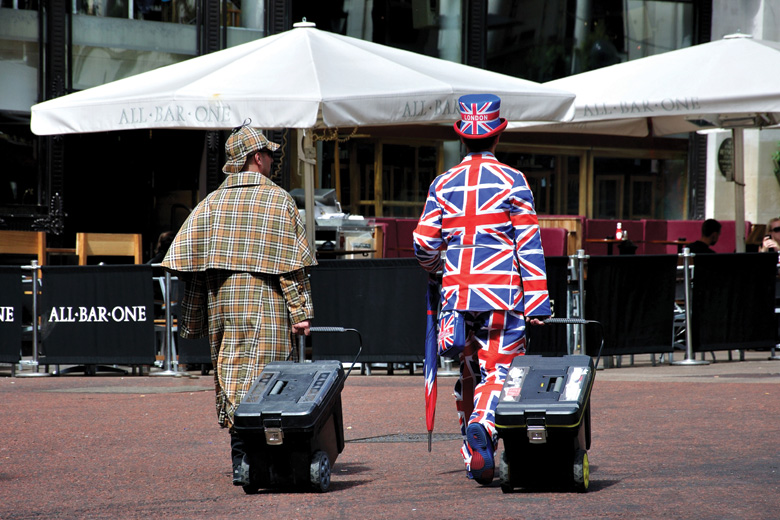 Street performers dressed in Sherlock Holmes and Union Jack costumes, London Street performers dressed in Sherlock Holmes and Union Jack costumes, London