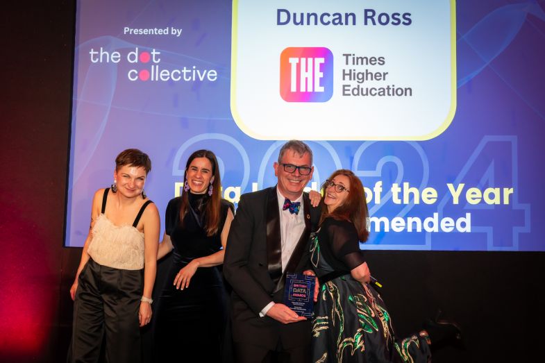 Duncan Ross, THE chief data officer receiving the award from Lucy Porter with representatives from the dot collective Picture of Duncan Ross, THE chief data officer receiving the award