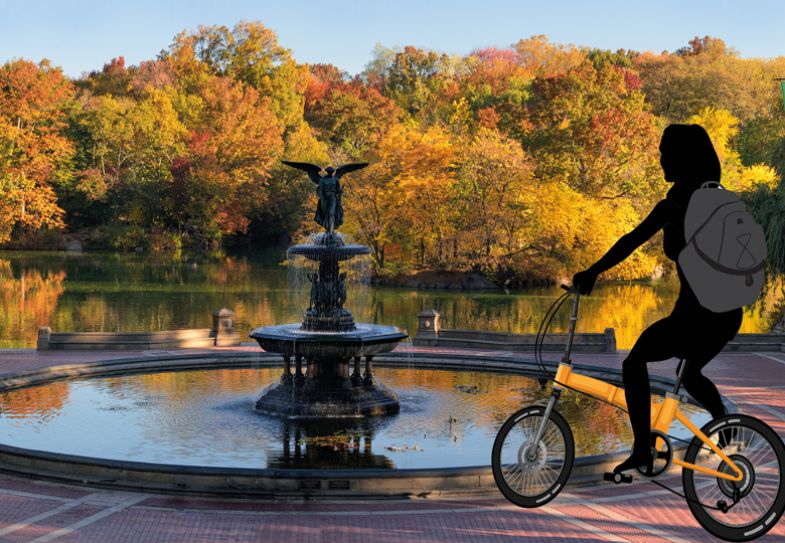 Montage of a lady cycling in Central Park at the Bethesda Fountain, New York Montage of a lady cycling in Central Park at the Bethesda Fountain, New York