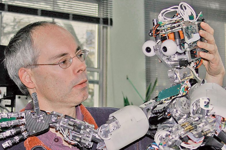 A man with a robot A man with a robot