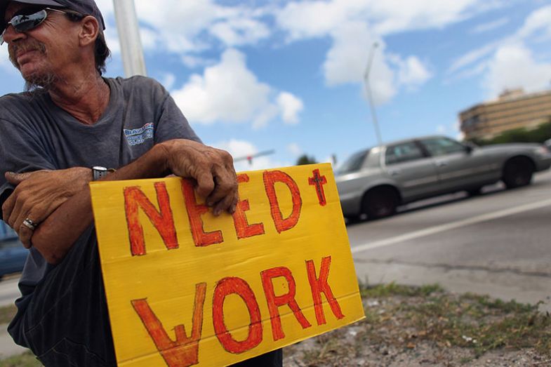 Man holding sign Man holding sign