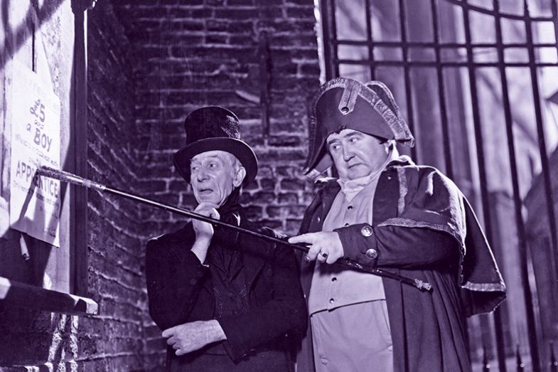 Mr Bumble puts up a sign