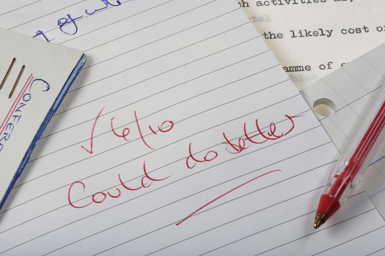 '6/10 Could do better' written in red ink '6/10 Could do better' written in red ink