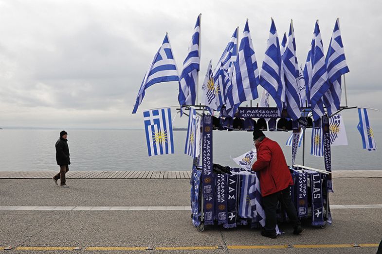 A street vendor sells Greek and Macedonian flags on Thessaloniki’s seafront promenade A street vendor sells Greek and Macedonian flags on Thessaloniki’s seafront promenade