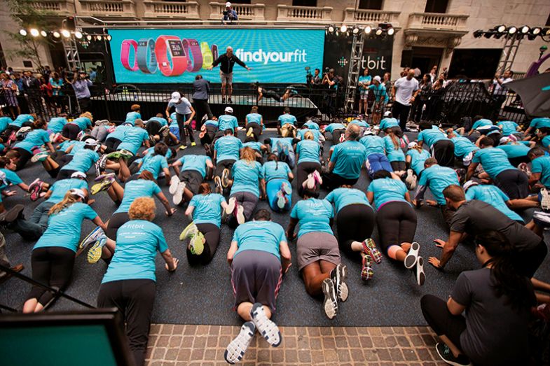 A workout outside the New York Stock Exchange after Fitbit’s initial public offering A workout outside the New York Stock Exchange after Fitbit’s initial public offering