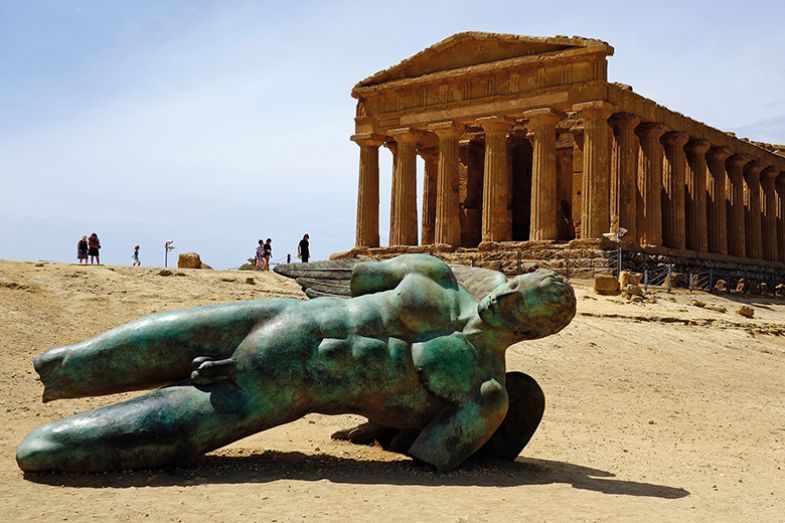 Sculpture of the fallen Icarus (2011) by the contemporary Polish artist, Igor Mitoraj, at the Temple of Concord in Agrigento Sculpture of the fallen Icarus (2011) by the contemporary Polish artist, Igor Mitoraj, at the Temple of Concord in Agrigento