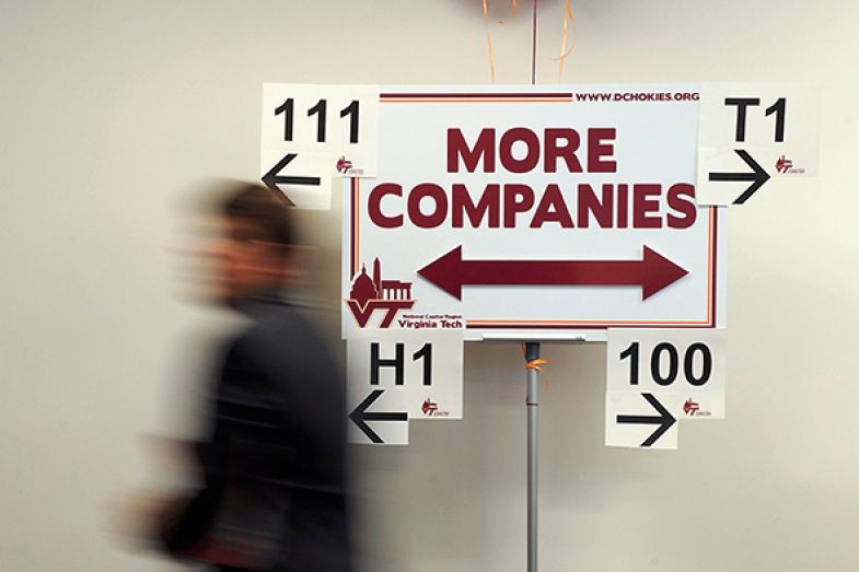 A sign points the way for job seekers A sign points the way for job seekers