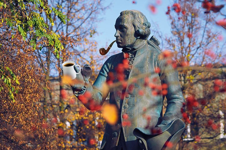 Statue of Kant with pipe and coffee cup Statue of Kant with pipe and coffee cup