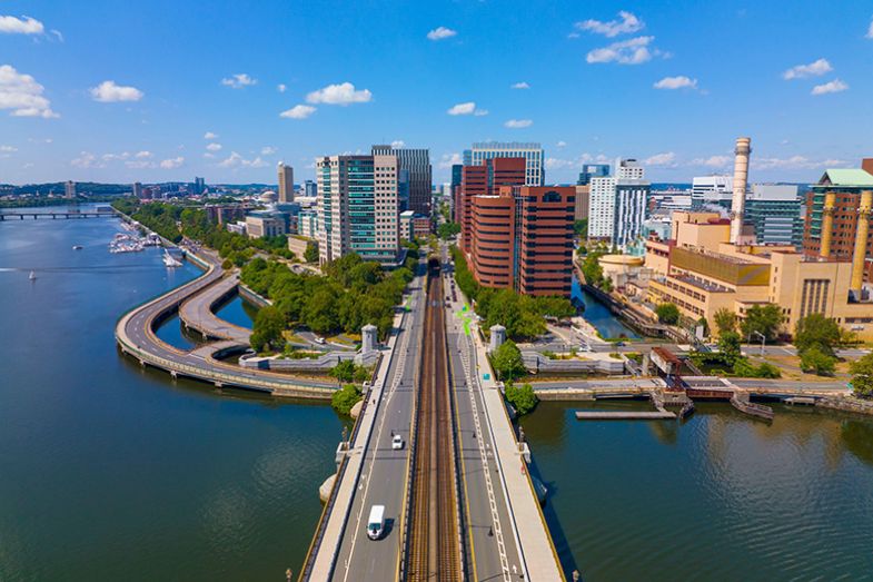 Cambridge Kendall Square skyline and Longfellow Bridge aerial view, Boston, Massachusetts, USA.