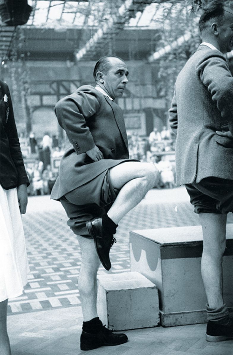 man balancing on one leg man balancing on one leg
