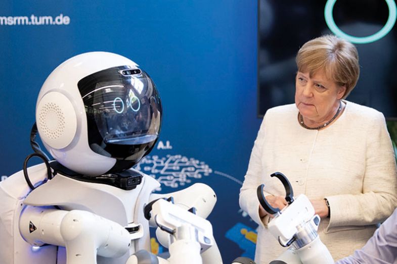 Angela Merkel takes a tour of the Munich School of Robotics and Machine Intelligence at the TUM Angela Merkel takes a tour of the Munich School of Robotics and Machine Intelligence at the TUM