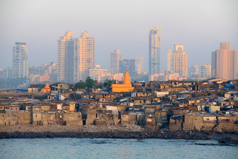 The city of Mumbai, showing poor housing and high-rise blocks. To illustrate inequalities in Indian society.
