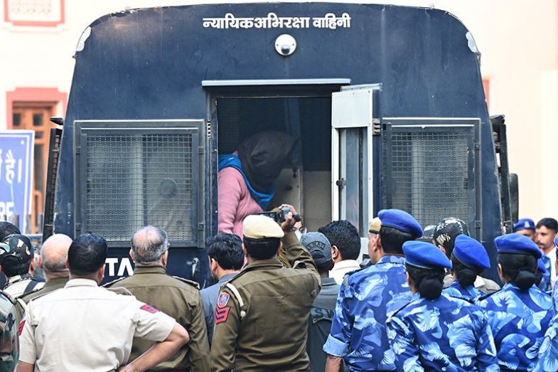 An accused in the car bomb blast near the Red Fort, face covered, being brought to the Patiala House Court on 20 November 2025 in New Delhi, India. 