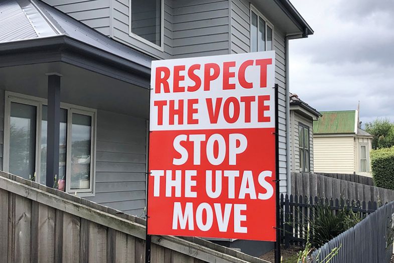 Sign saying 'Respect the vote: stop the UTAS move' Sign saying 'Respect the vote: stop the UTAS move'