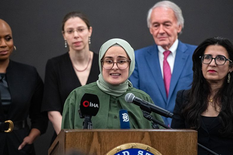 Rumeysa Ozturk (C) speaks at a press conference at Logan International Airport in Boston, Massachusetts on 10 May, 2025.
