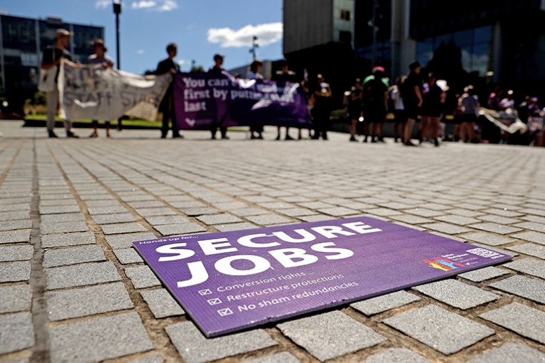 A placard during a protest organised by the National Tertiary Education Union at the University of Sydney, Australia, on 9 March 2023. International education was worth A$14.6 billion ($10.7 billion) to New South Wales in 2019, the state government said.
