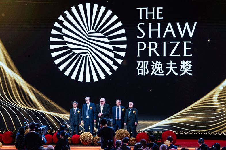 Reinhard Genzel (C), chair of the Board of Adjudicators of the Shaw Prize Foundation, poses for a group photo with this year’s laureates at the Grand Hall of the Hong Kong Convention and Exhibition Centre on 21 October 2025 in Hong Kong, China. Reinhard Genzel (C), chair of the Board of Adjudicators of the Shaw Prize Foundation, poses for a group photo with this year’s laureates at the Grand Hall of the Hong Kong Convention and Exhibition Centre on 21 October 2025 in Hong Kong, China.