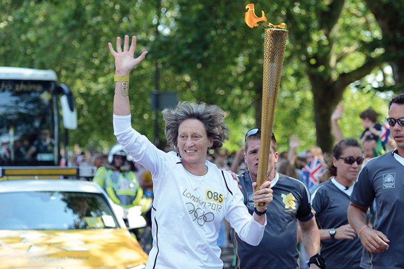 Sarah Springman carries the Olympic flame during the London 2012 Olympic Torch relay Sarah Springman carries the Olympic flame during the London 2012 Olympic Torch relay