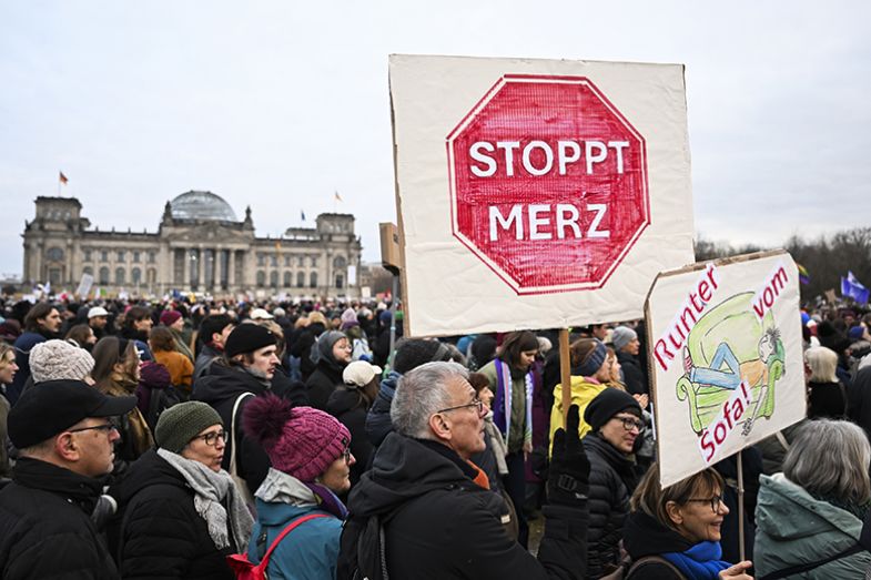 Protesters gather in front of the Reichstag building to oppose the Christian Democratic parties (CDU/CSU) for collaborating with the far-right Alternative for Germany (AfD) on a proposal to tighten immigration policies in Germany on 2 February 2025 Protesters gather in front of the Reichstag building to oppose the Christian Democratic parties (CDU/CSU) for collaborating with the far-right Alternative for Germany (AfD) on a proposal to tighten immigration policies in Germany on 2 February 2025