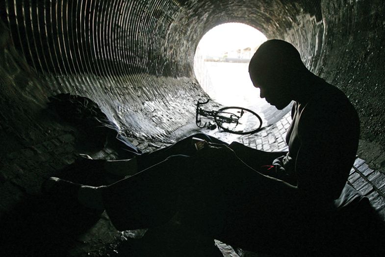 A man in a storm drain A man in a storm drain