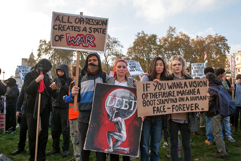 Students protest against fees and cuts and debt in central London, UK, 2016. Students protest against fees and cuts and debt in central London, UK, 2016.