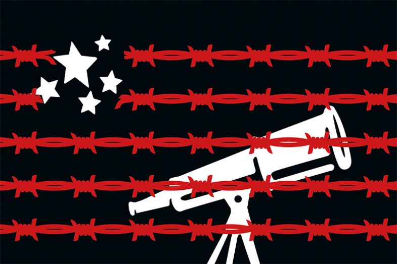 telescope behind barbed wire Telescope behind barbed wire