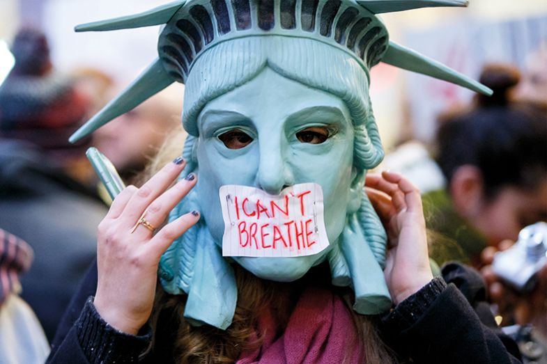 People demonstrate in London, England after grand juries decided not to indict the police officers involved in the death of Eric Garner in New York People demonstrate in London, England after grand juries decided not to indict the police officers involved in the death of Eric Garner in New York