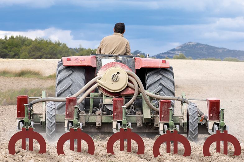 Tractor ploughing with euros