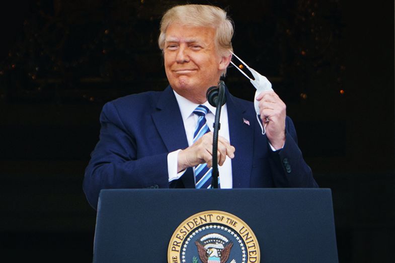 US President Donald Trump takes his mask off before speaking from the South Portico of the White House in Washington, DC during a rally on 10 October 2020. Trump spoke publicly for the first time since testing positive for Covid-19 US President Donald Trump takes his mask off before speaking from the South Portico of the White House in Washington, DC during a rally on 10 October 2020. Trump spoke publicly for the first time since testing positive for Covid-19