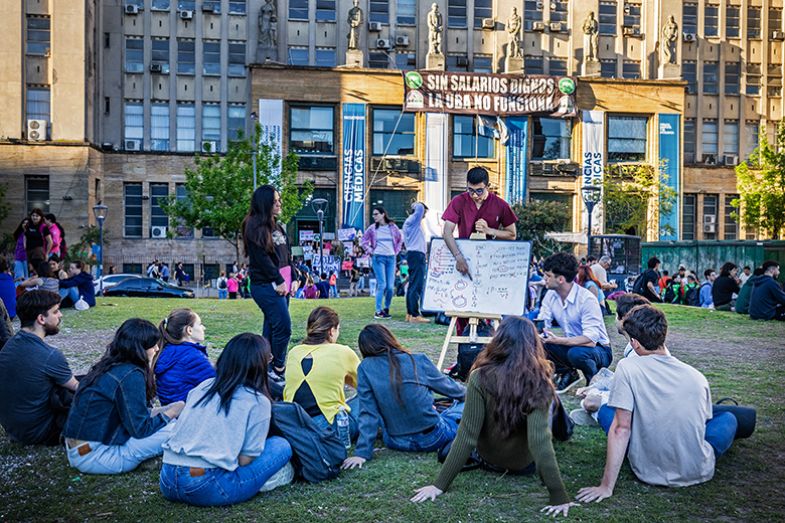 An anatomy class outside the Faculty of Medicine, Buenos Aires, Argentina, for a group of students as a form of protest demanding a salary increase and an increase in the budget allocated to universities, 16 October 2024. An anatomy class outside the Faculty of Medicine, Buenos Aires, Argentina, for a group of students as a form of protest demanding a salary increase and an increase in the budget allocated to universities, 16 October 2024.