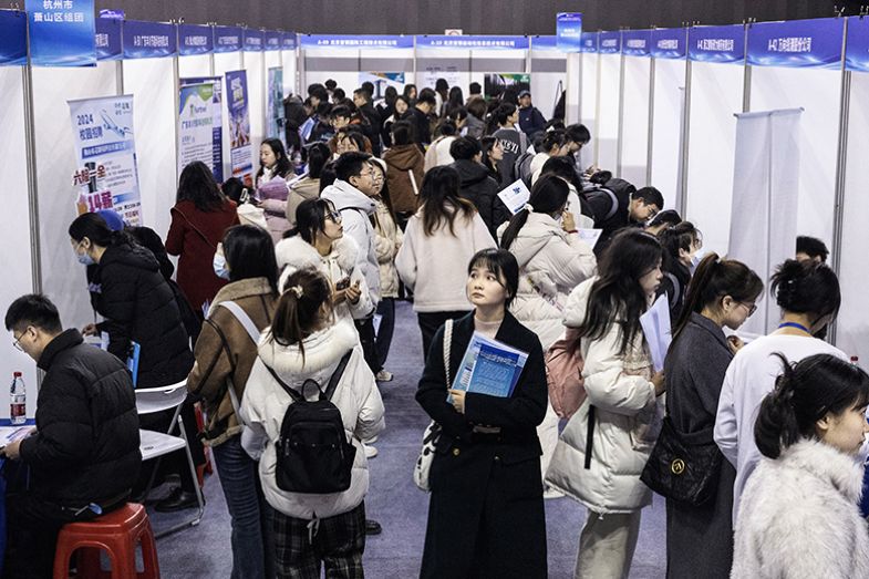 University students attend a job fair in Wuhan, in central China’s Hubei province on 6 March 2024.