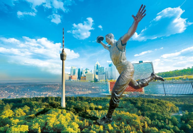 Montage of a statue of a man leaping in the Stuttgart skyline Montage of a statue of a man leaping in the Stuttgart skyline to illustrate Having my pretzel and eating it
