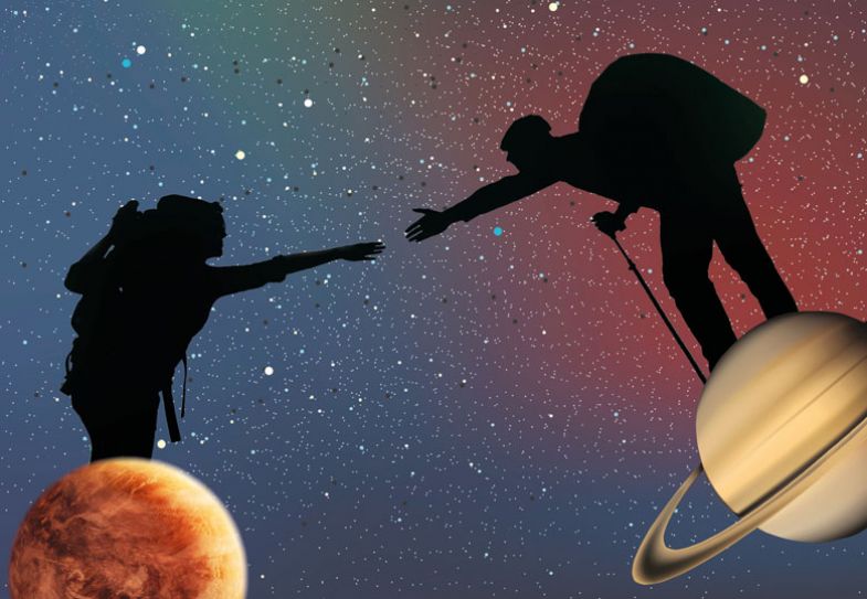 Silhouette of two people reaching out to each other, each standing on a different planet. Silhouette of two people reaching out to each other, each standing on a different planet.