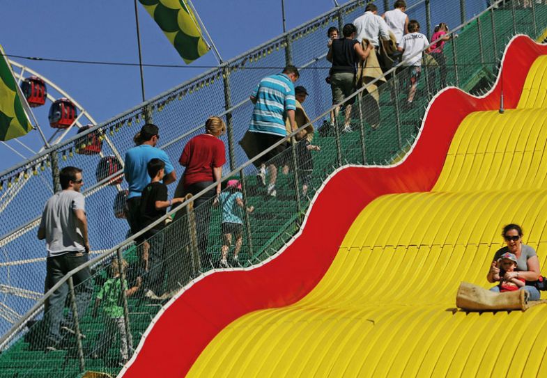 ydneysiders ride the Big Slide at the Royal Easter Show at the Sydney Showground ydneysiders ride the Big Slide at the Royal Easter Show at the Sydney Showground
