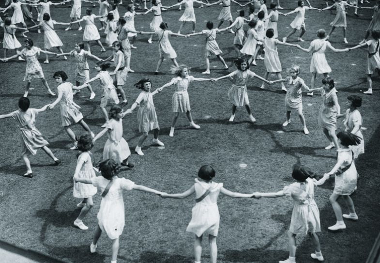 Schoolgirls of Plaistow Municipal Secondary School in West Ham, London, performing country dances during celebrations Schoolgirls of Plaistow Municipal Secondary School in West Ham, London, performing country dances during celebrations to illustrate Play by playground rules