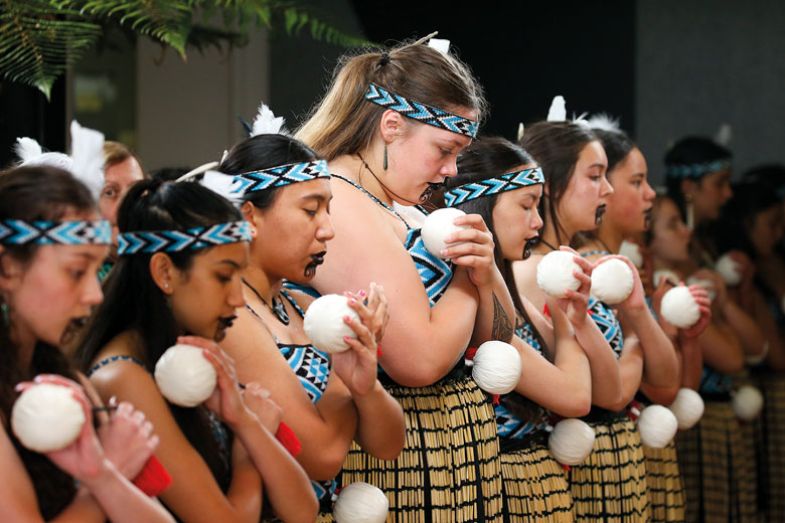 Members of a Maori cultural group perform Members of a Maori cultural group perform