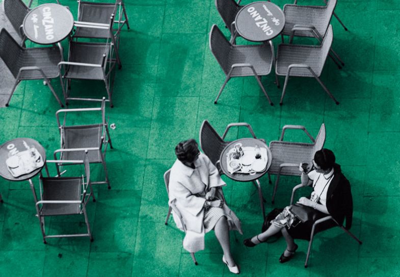 Two women are sitting at a pavement cafe in Italy Two women are sitting at a pavement cafe in Italy to illustrate Friends of convenience