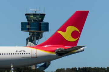 A Tianjin Airlines Airbus A330-243 plane, registration B-8776, has landed from Chongqing as flight GS7943 and taxiing to the international terminal of Sydney Kingsford-Smith Airport. This image was taken from Kyeemagh, Botany Bay, on a hot and sunny after A Tianjin Airlines Airbus A330-243 plane, registration B-8776, has landed from Chongqing as flight GS7943 and taxiing to the international terminal of Sydney Kingsford-Smith Airport. This image was taken from Kyeemagh, Botany Bay, on a hot and sunny after