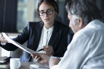 a woman advises a man