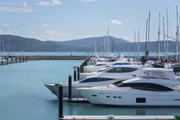 Airlie Beach, Queensland, Australia - April 2021 Luxury yachts moored at Coral Sea Marina