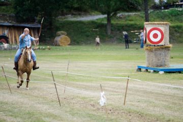 Archer firing arrow from horseback Archer firing arrow from horseback