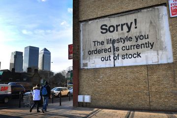 A stencil and spray paint artwork, by Banksy, East London, UK. It shows the message 'Sorry! The lifestyle you ordered is currently out of stock'. To illustrate that universities are increasingly deferring wage increases. A stencil and spray paint artwork, by Banksy, East London, UK. It shows the message 'Sorry! The lifestyle you ordered is currently out of stock'. To illustrate that universities are increasingly deferring wage increases.