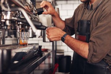 Barista making coffee