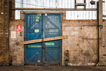 A barred door in a warehouse